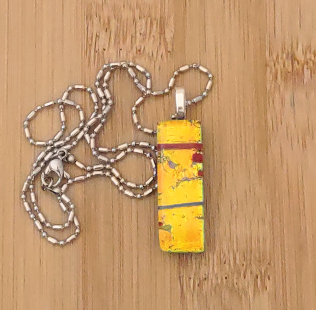 Orange-Yellow Fused Glass Dichroic Pendant with Red and Blue Accent