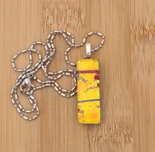 Orange-Yellow Fused Glass Dichroic Pendant with Red and Blue Accent
