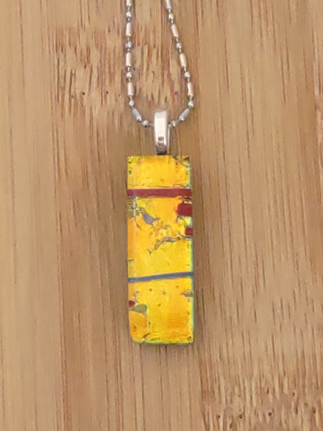 Orange-Yellow Fused Glass Dichroic Pendant with Red and Blue Accent