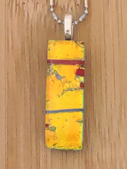 Orange-Yellow Fused Glass Dichroic Pendant with Red and Blue Accent