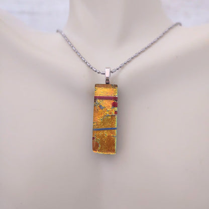 Orange-Yellow Fused Glass Dichroic Pendant with Red and Blue Accent